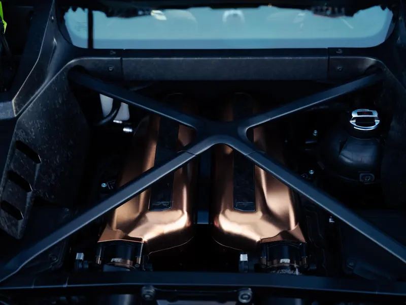 Lamborghini Huracan engine bay cleaned and dressed under glass
