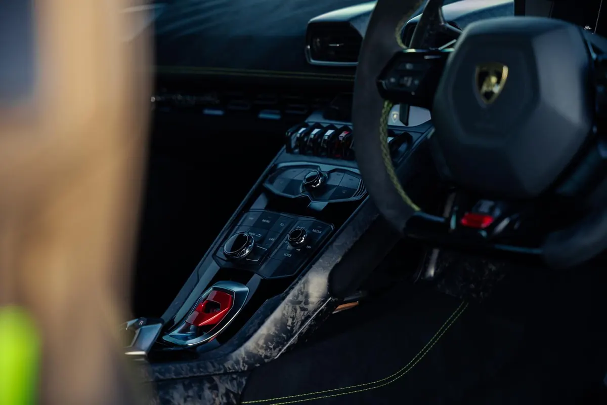 Lamborghini Huracan cabin after a full interior detail, console and stitching clean